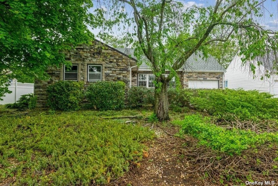 3627 Farm Ranch Road South Bethpage, NY 11714 - Photo 1 of 1 front view of a house with a big yard