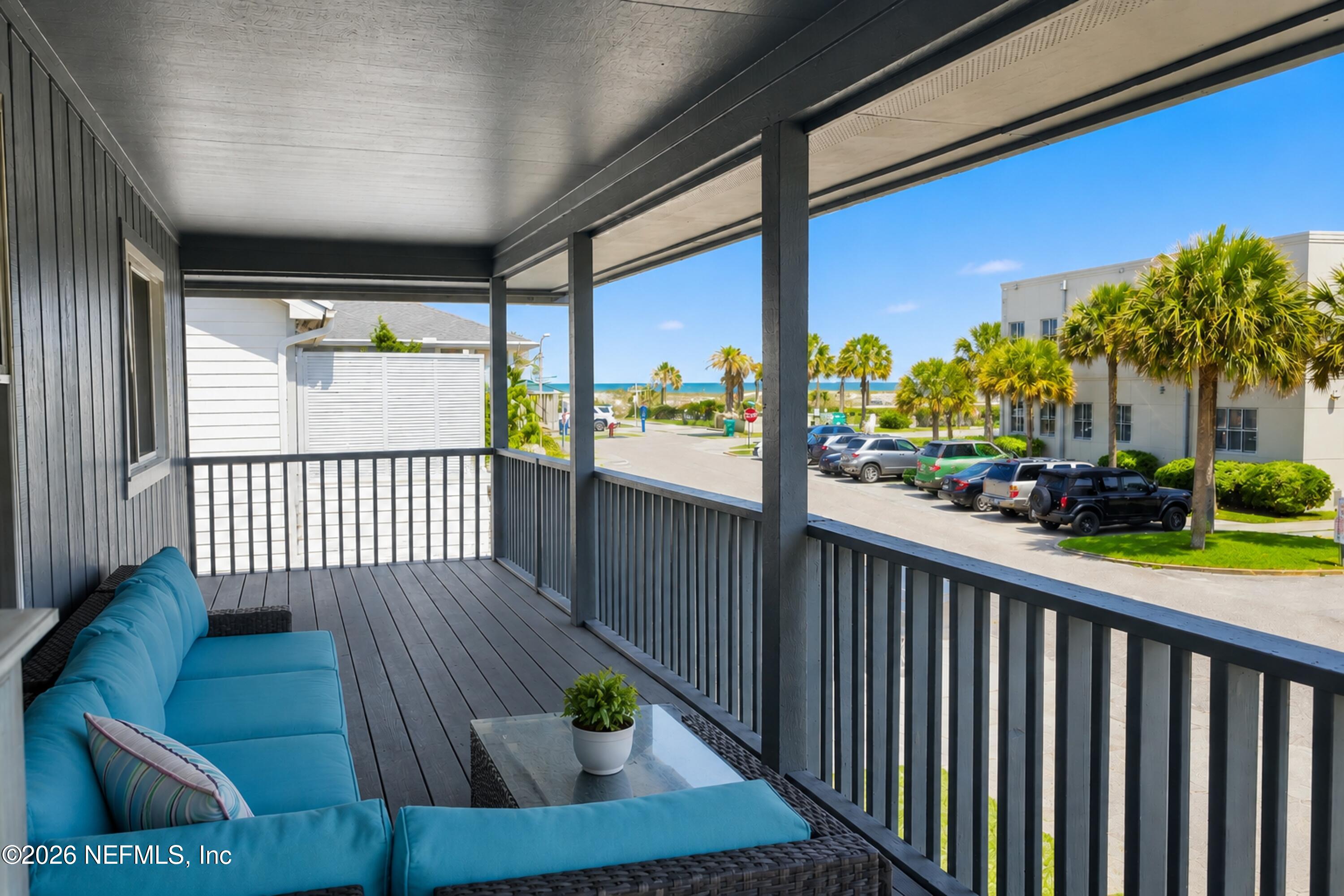 124 Hopkins Street Neptune Beach, FL 32266 - Photo 3 of 44 a view of a porch with furniture