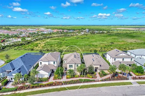an aerial view of a house with a garden