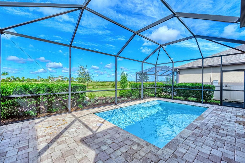 8216 Summer Night Road Sarasota, FL 34241 - Photo 24 of 60 a view of a backyard