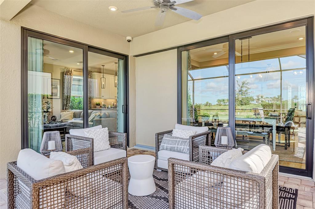 8216 Summer Night Road Sarasota, FL 34241 - Photo 25 of 60 a living room with furniture and a window