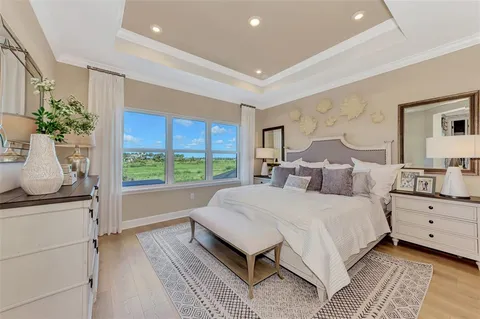 a view of a livingroom with furniture and wooden floor
