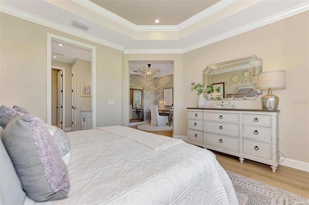 8216 Summer Night Road Sarasota, FL 34241 - Photo 36 of 60 a bedroom with a bed and a dresser