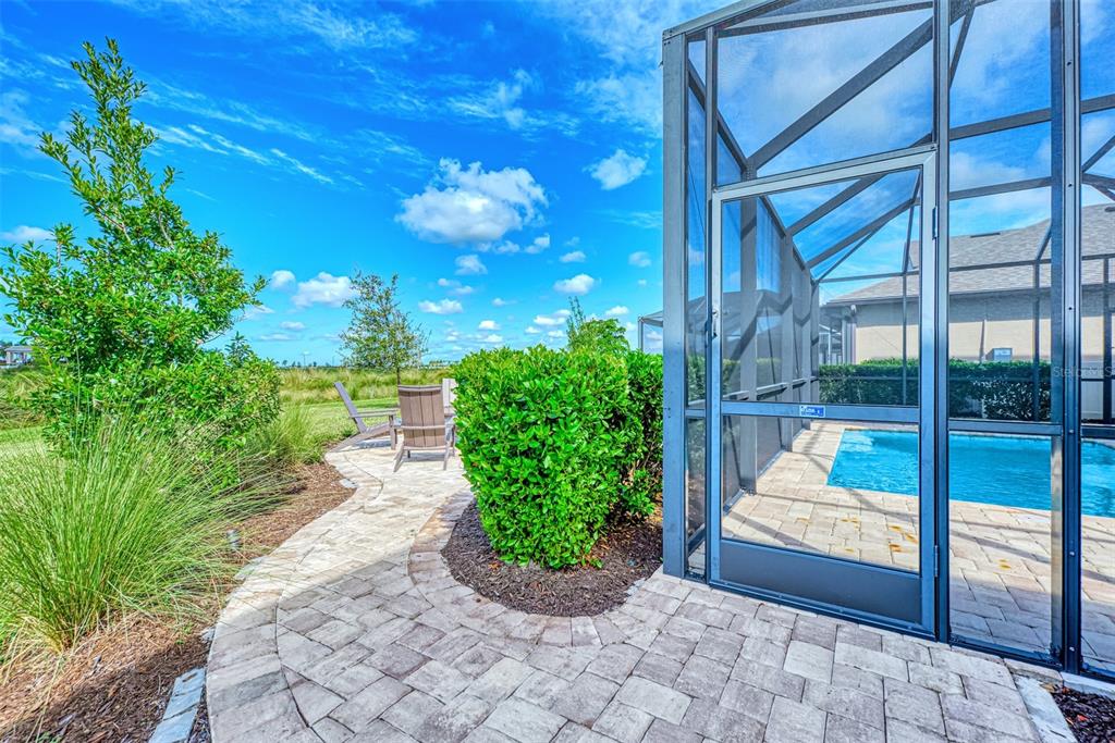 8216 Summer Night Road Sarasota, FL 34241 - Photo 4 of 60 a view of a pathway with a yard