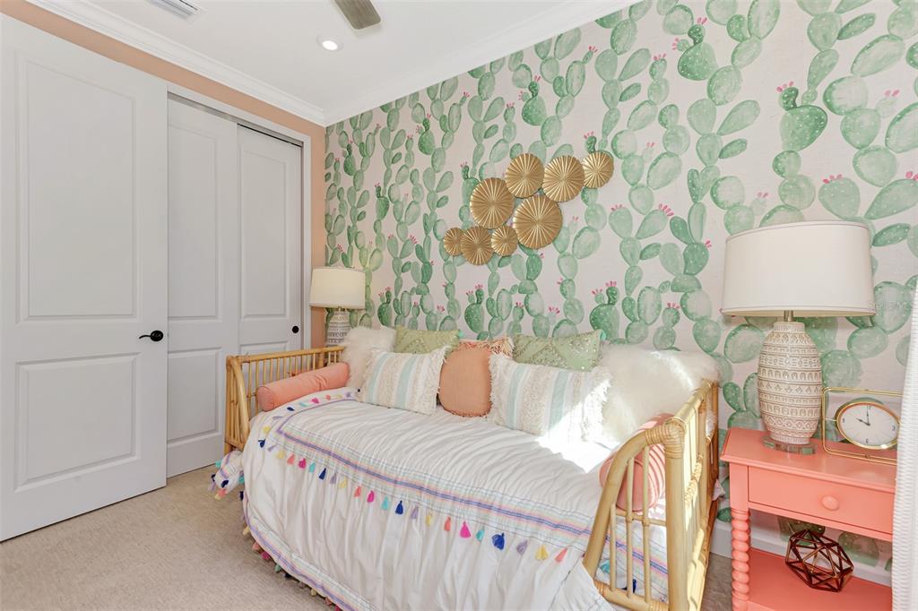 8216 Summer Night Road Sarasota, FL 34241 - Photo 45 of 60 a bedroom with a bed and a lamp on table