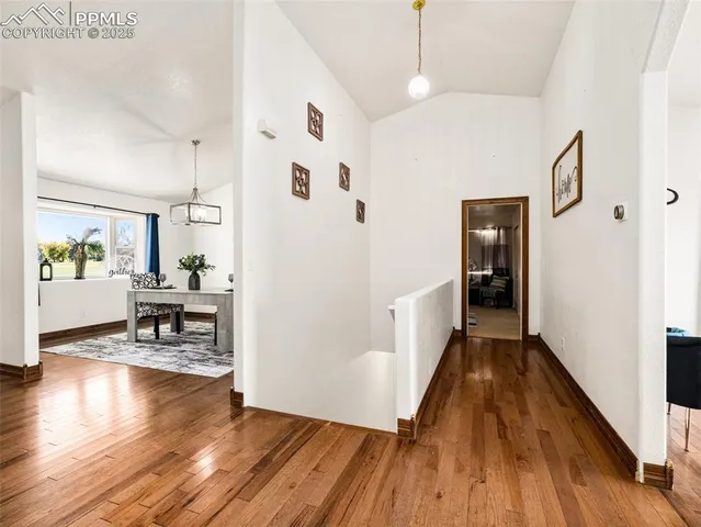 a view of a living room and dining room