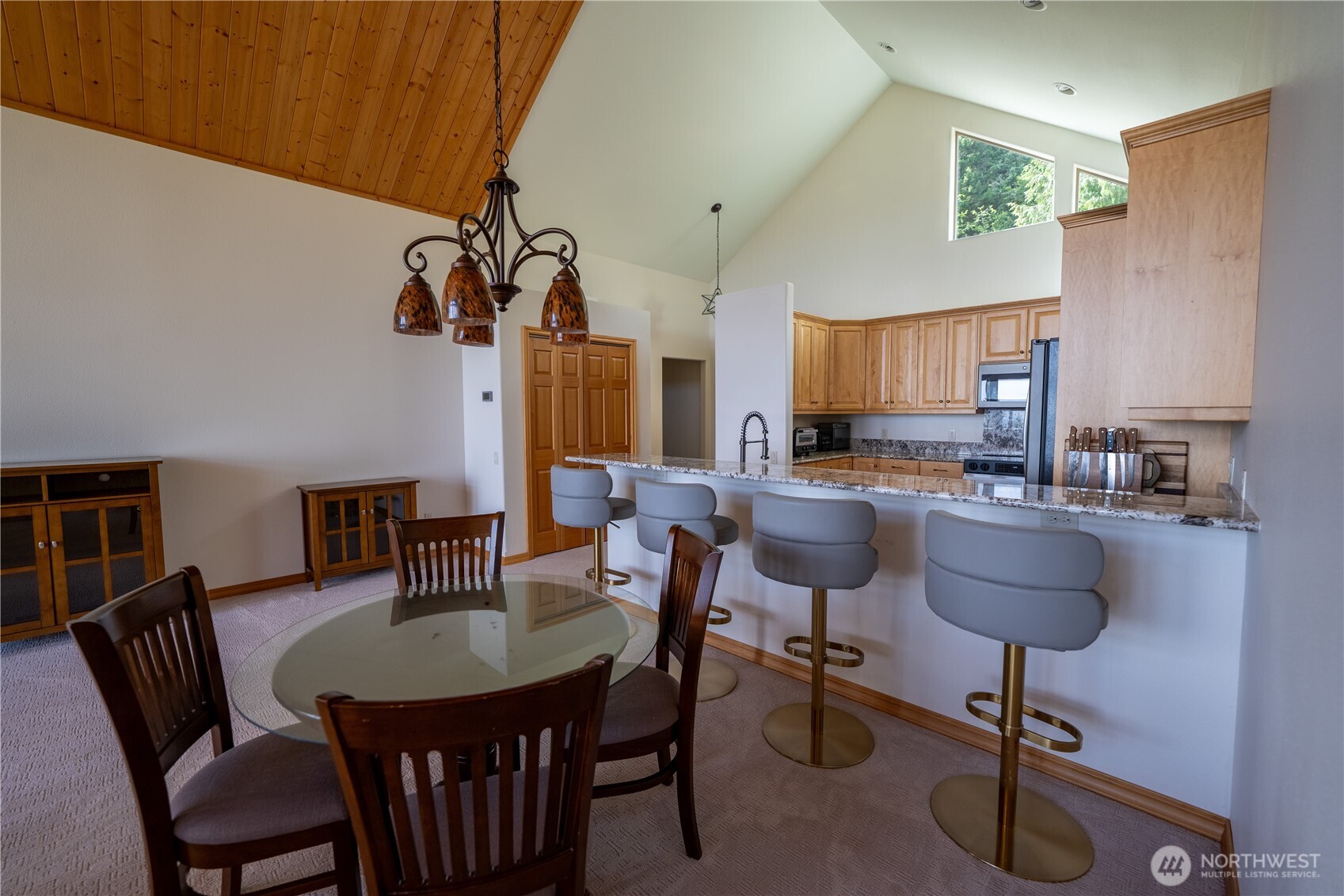 212 Maletti Hill Road Port Angeles, WA 98362 - Photo 12 of 37 a dining room with furniture and window