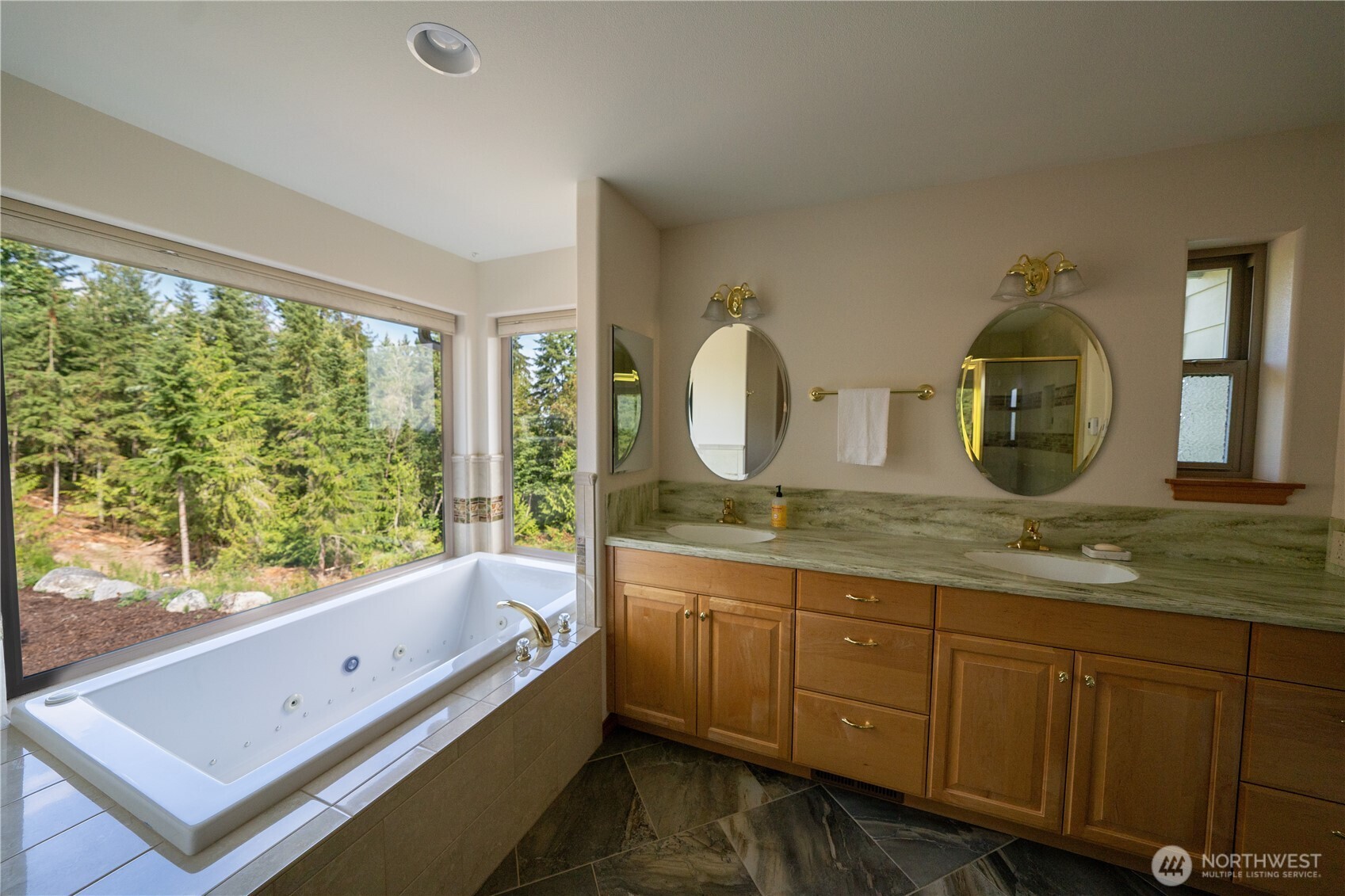 212 Maletti Hill Road Port Angeles, WA 98362 - Photo 21 of 37 a bathroom with a granite countertop sink mirror and window