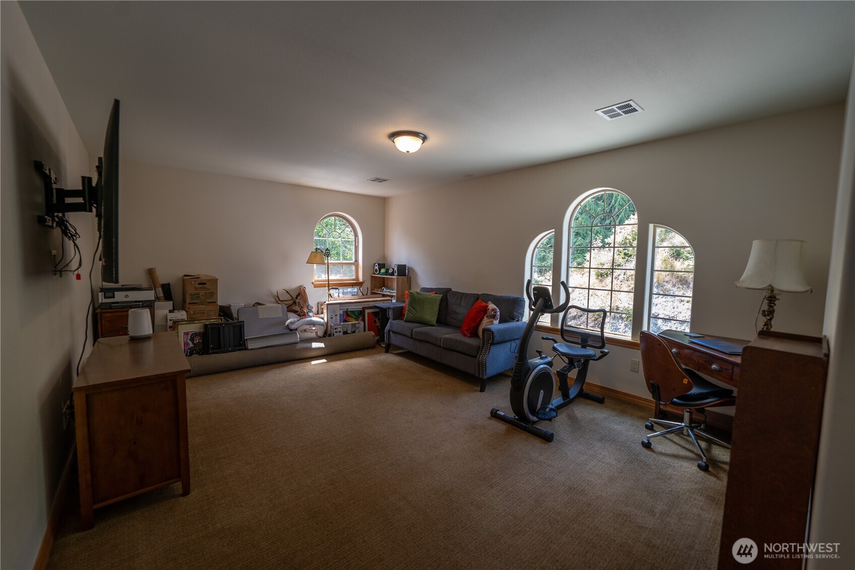 212 Maletti Hill Road Port Angeles, WA 98362 - Photo 35 of 37 a view of a livingroom with furniture and a mirror