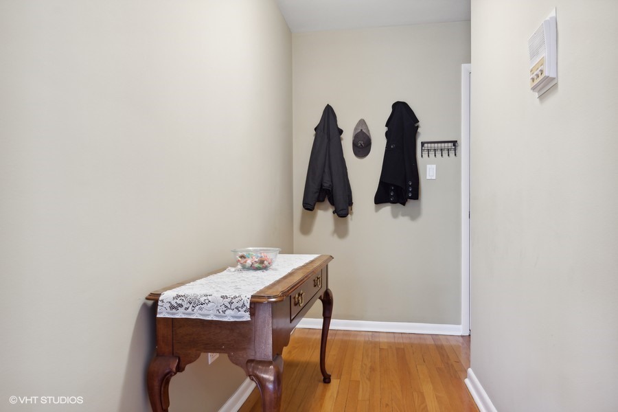 2145 Ridge Avenue, Unit 3A Evanston, IL 60201 - Photo 10 of 11 a bathroom with a sink toilet and mirror
