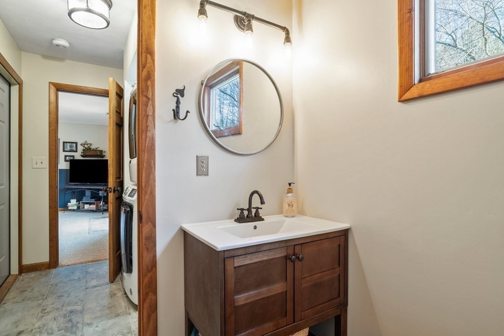 83 Thayer Road Monson, MA 01057 - Photo 11 of 42 a bathroom with a sink and a mirror
