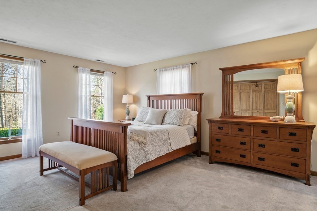 83 Thayer Road Monson, MA 01057 - Photo 18 of 42 a bedroom with a bed and a dresser