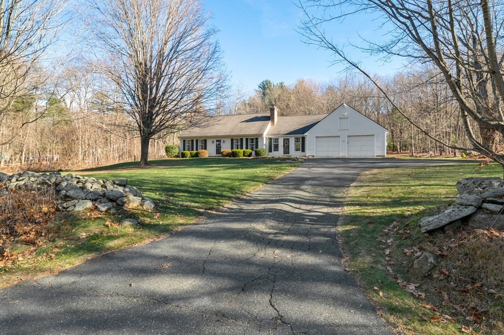 83 Thayer Road Monson, MA 01057 - Photo 2 of 42 a front view of a house with a yard