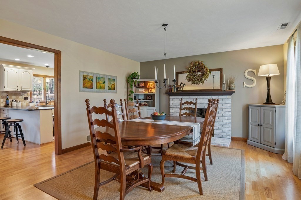 83 Thayer Road Monson, MA 01057 - Photo 24 of 42 a view of a dining room with furniture window and wooden floor