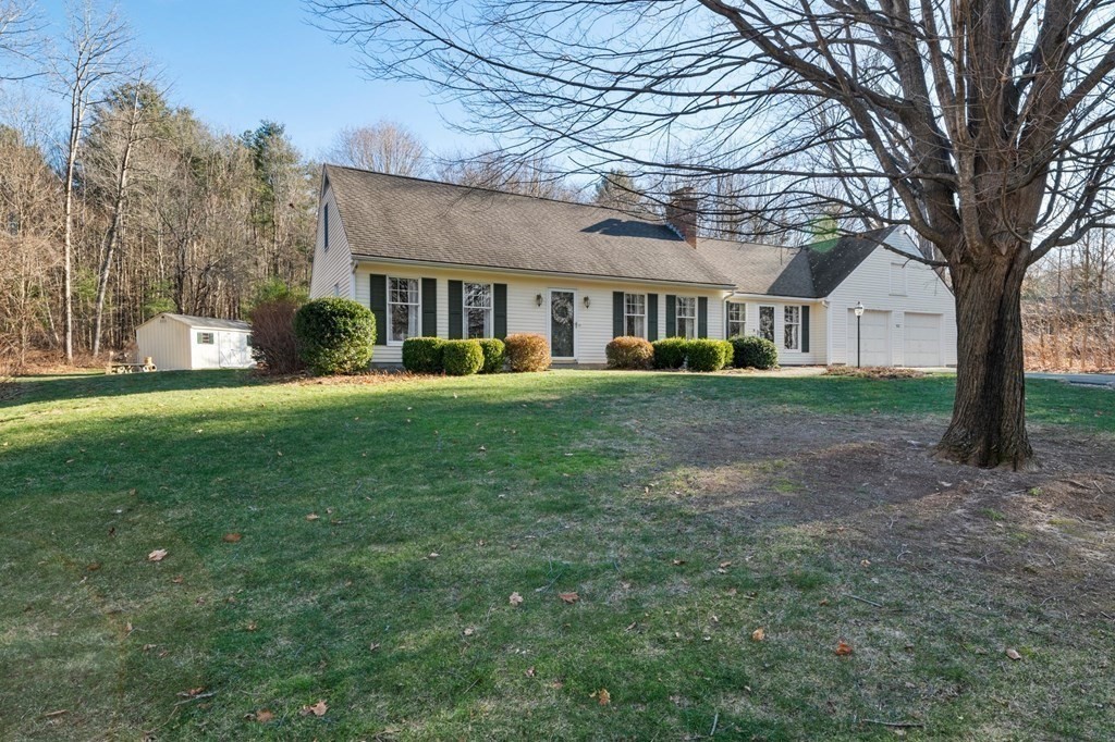 83 Thayer Road Monson, MA 01057 - Photo 3 of 42 a front view of a house with a yard