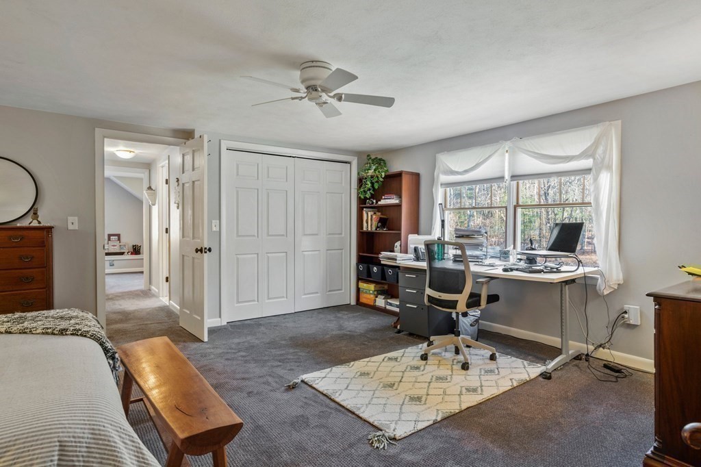 83 Thayer Road Monson, MA 01057 - Photo 31 of 42 a living room with a couch and a table