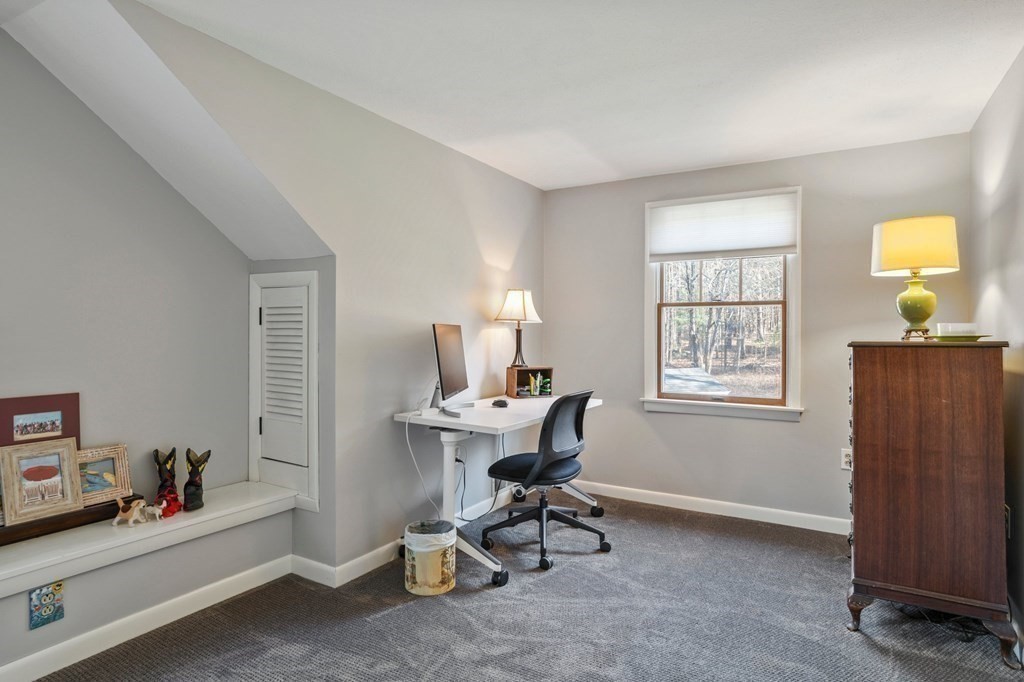 83 Thayer Road Monson, MA 01057 - Photo 38 of 42 a work room with furniture a lamp and a window