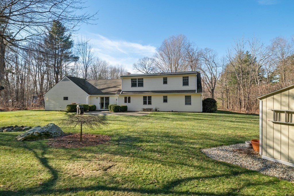 83 Thayer Road Monson, MA 01057 - Photo 40 of 42 a view of a house with a big yard and large tree
