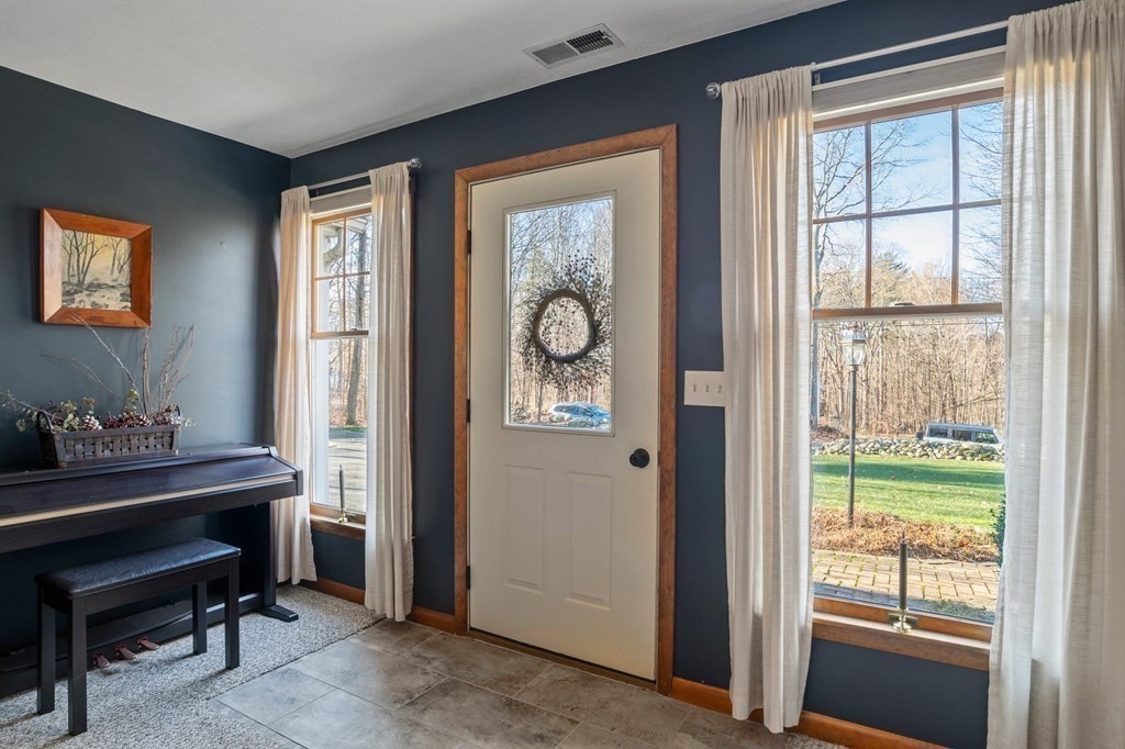 83 Thayer Road Monson, MA 01057 - Photo 5 of 42 a room that has a window and a dresser