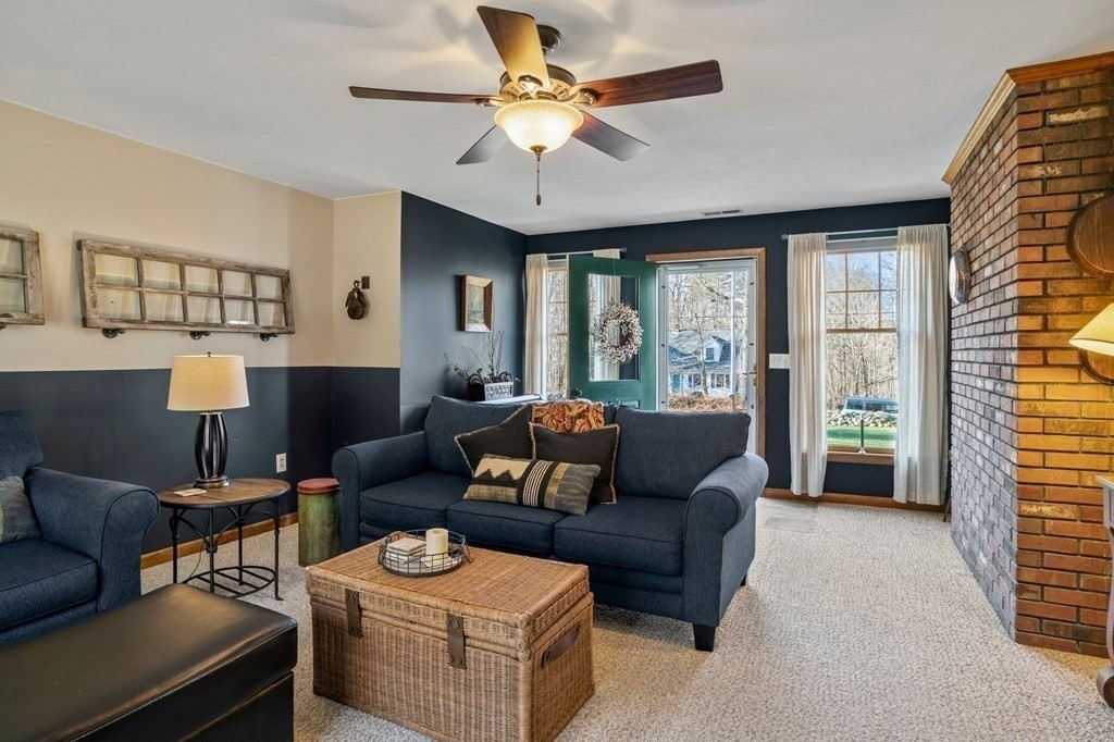83 Thayer Road Monson, MA 01057 - Photo 6 of 42 a living room with furniture and a large window