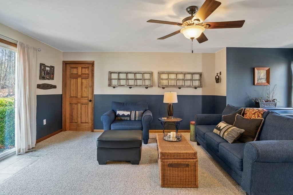 83 Thayer Road Monson, MA 01057 - Photo 8 of 42 a living room with furniture and a ceiling fan