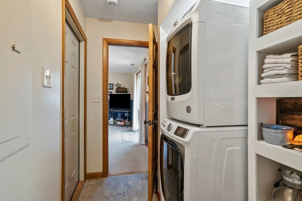 83 Thayer Road Monson, MA 01057 - Photo 9 of 42 a view of walk in closet with living room