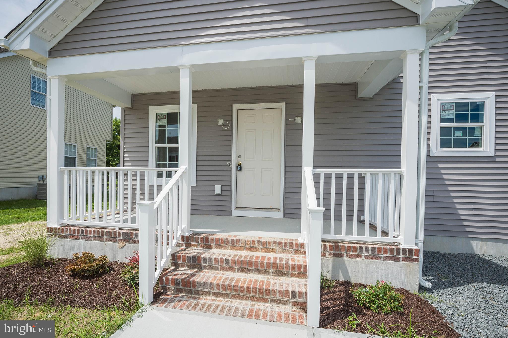 113 Morgan Run Snow Hill, MD 21863 - Photo 33 of 35 a front view of a house with a porch