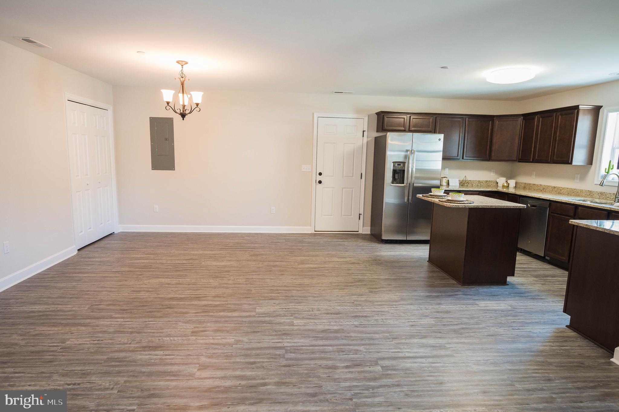 113 Morgan Run Snow Hill, MD 21863 - Photo 6 of 35 a view of a kitchen with cabinets and stainless steel appliances