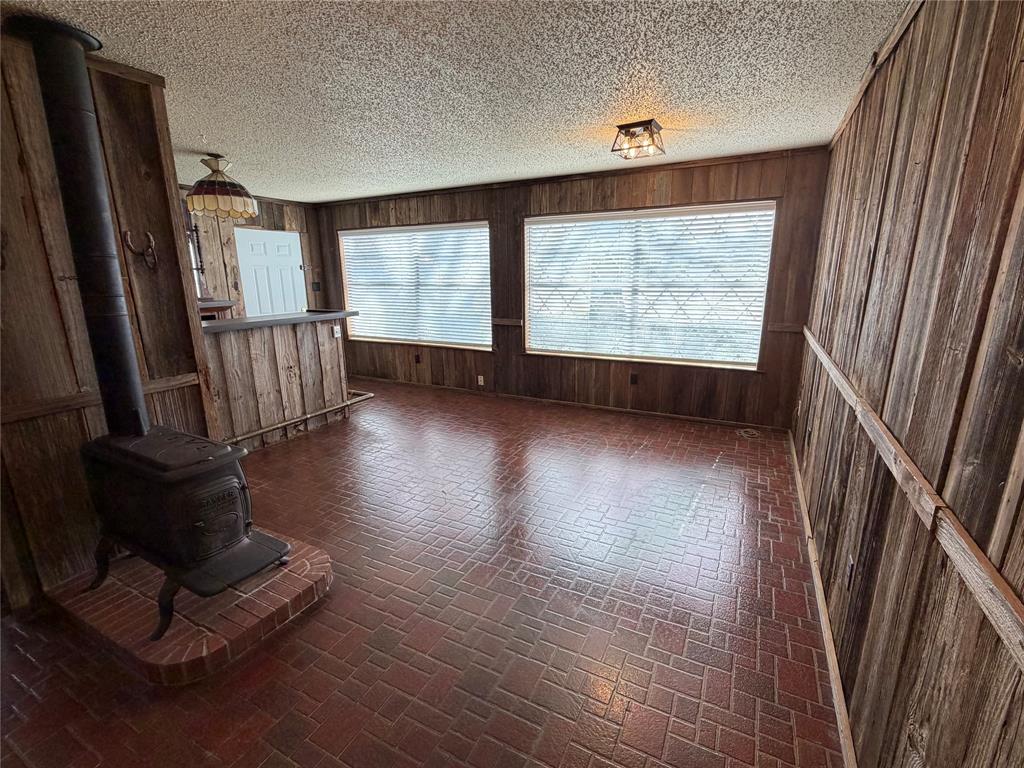 821 East Highway 199 Springtown, TX 76082 - Photo 14 of 26 a view of entryway with wooden floor