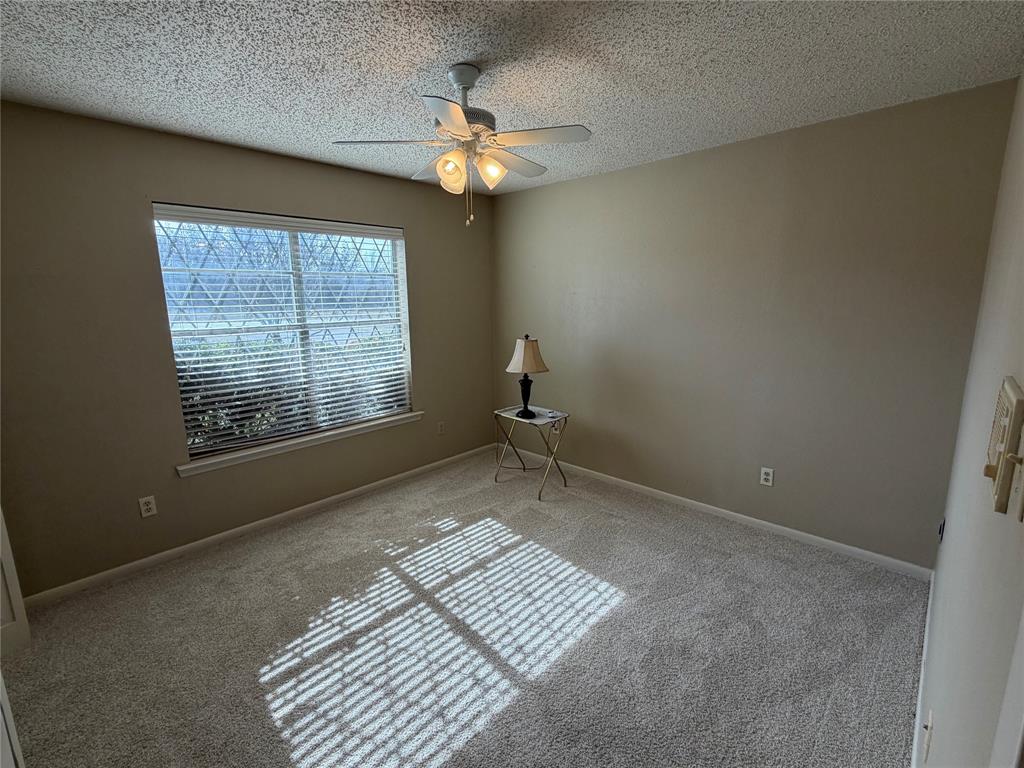 821 East Highway 199 Springtown, TX 76082 - Photo 18 of 26 a view of an empty room with a window