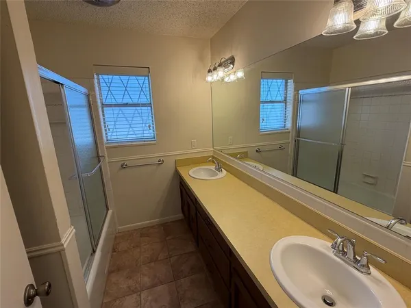 a bathroom with a sink and a tub