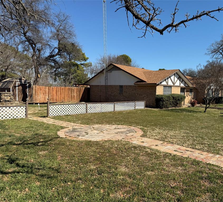 821 East Highway 199 Springtown, TX 76082 - Photo 3 of 26 a view of a large house with a yard