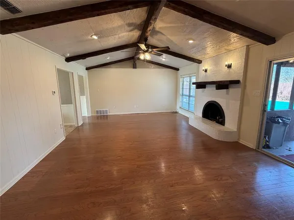 a view of a hallway with washer and dryer