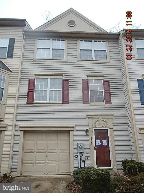 9324 Daly Court Laurel, MD 20723 - Photo 1 of 9 a front view of a house with a yard