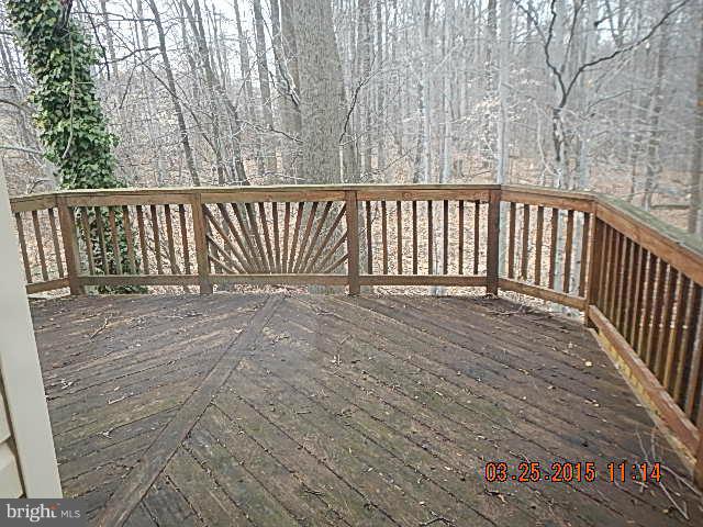 9324 Daly Court Laurel, MD 20723 - Photo 3 of 9 a view of a wooden fence