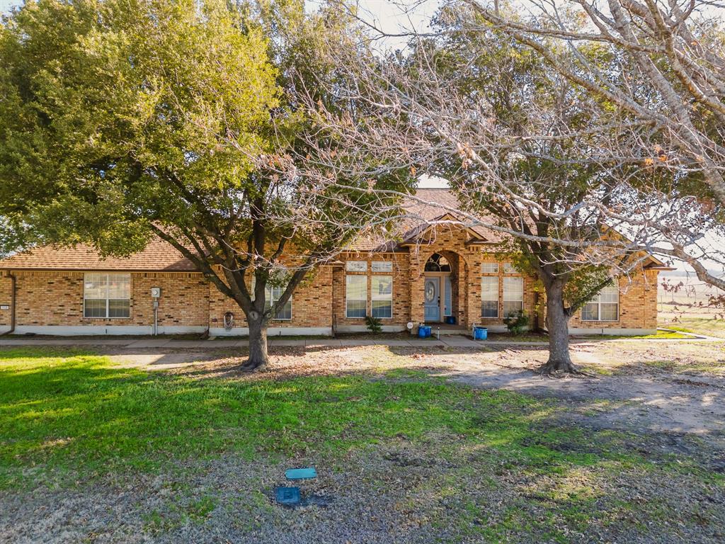 130 Blazek Road Alma, TX 75119 - Photo 4 of 30 View of front of home featuring a front yard