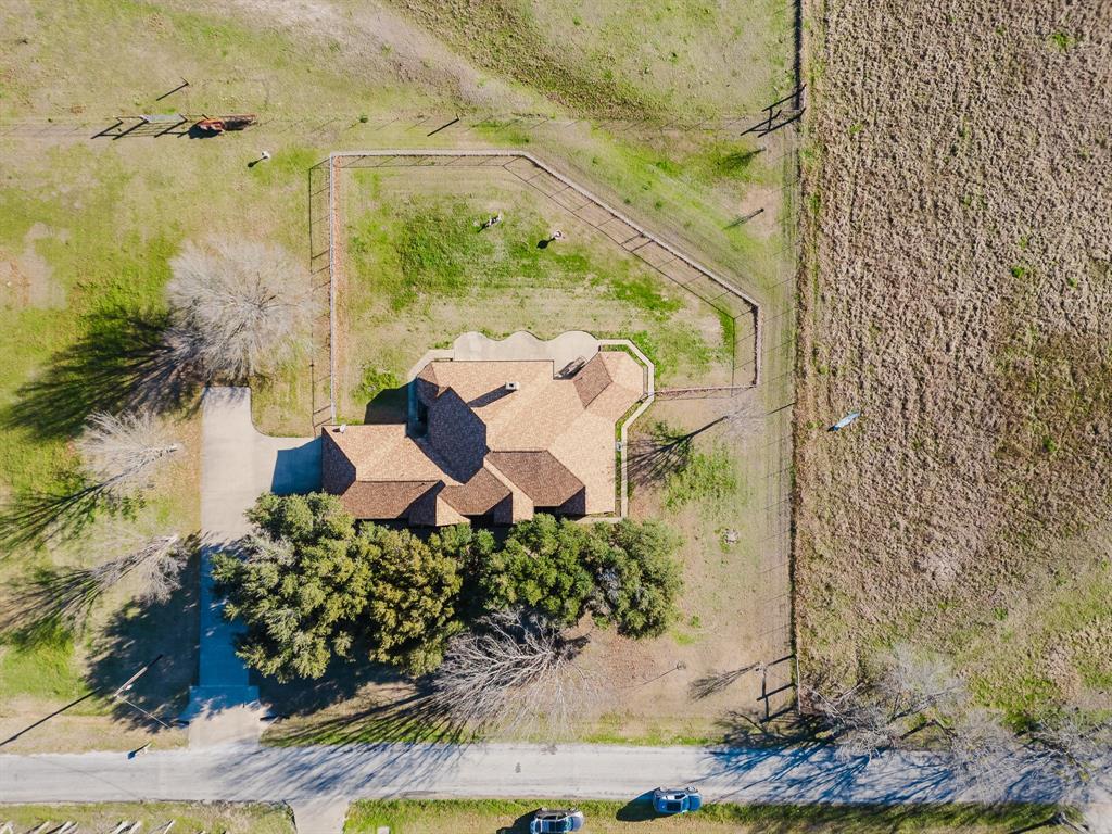 130 Blazek Road Alma, TX 75119 - Photo 6 of 30 Drone / aerial view with a rural view