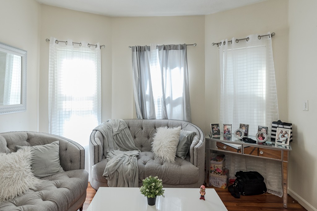 14 Chatham Road Everett, MA 02149 - Photo 4 of 10 a living room with furniture and a large window