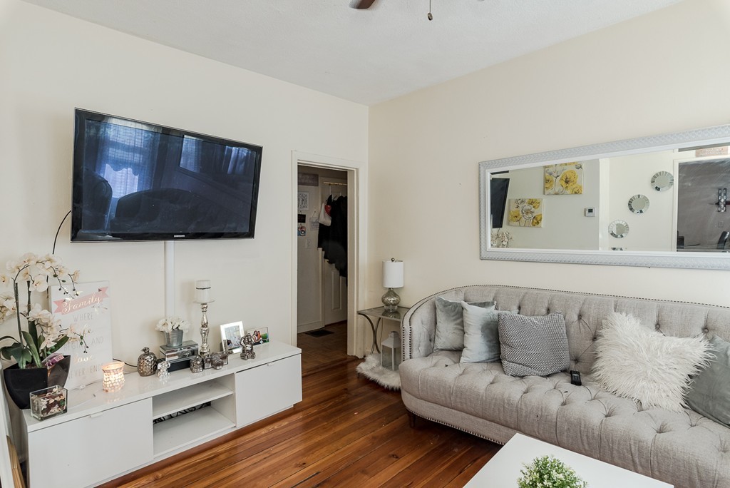 14 Chatham Road Everett, MA 02149 - Photo 5 of 10 a living room with furniture and a flat screen tv