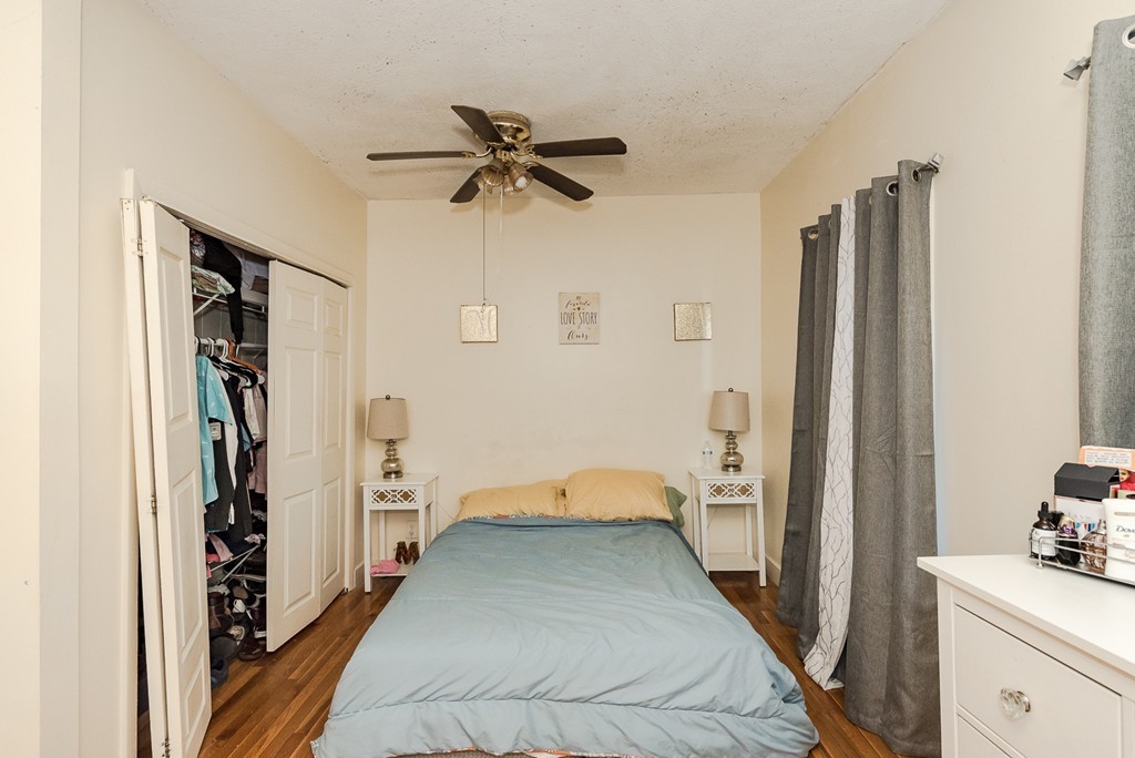 14 Chatham Road Everett, MA 02149 - Photo 7 of 10 a view of a bedroom with a hardwood floor