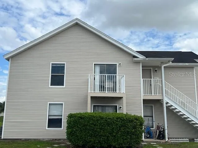 a front view of a house with garage