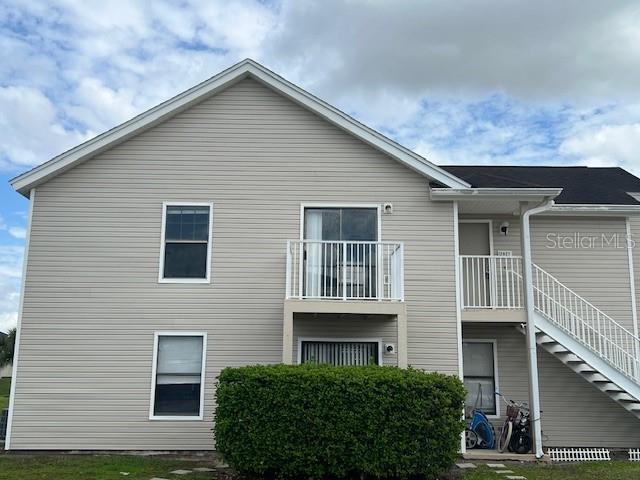 a front view of a house with garage