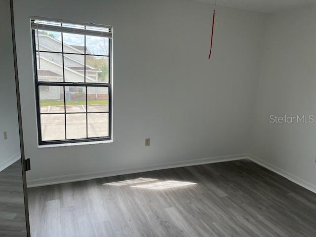 2927 Rio Grande Trail, Unit 2927 Kissimmee, FL 34741 - Photo 3 of 11 an empty room with a window