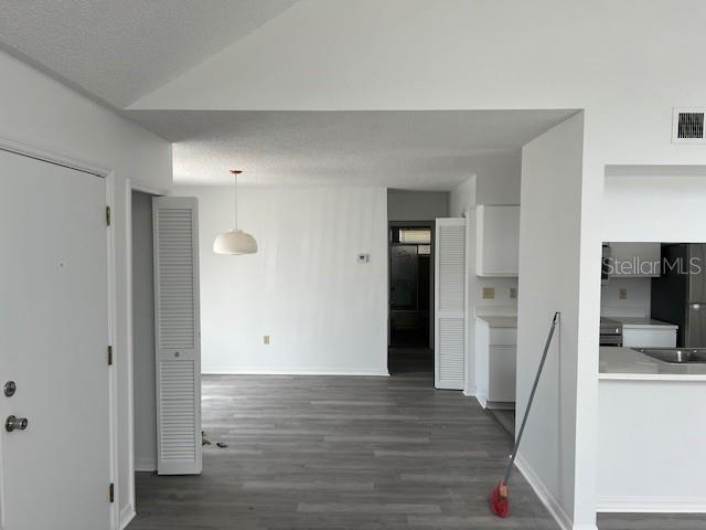 2927 Rio Grande Trail, Unit 2927 Kissimmee, FL 34741 - Photo 7 of 11 wooden floor in an empty room