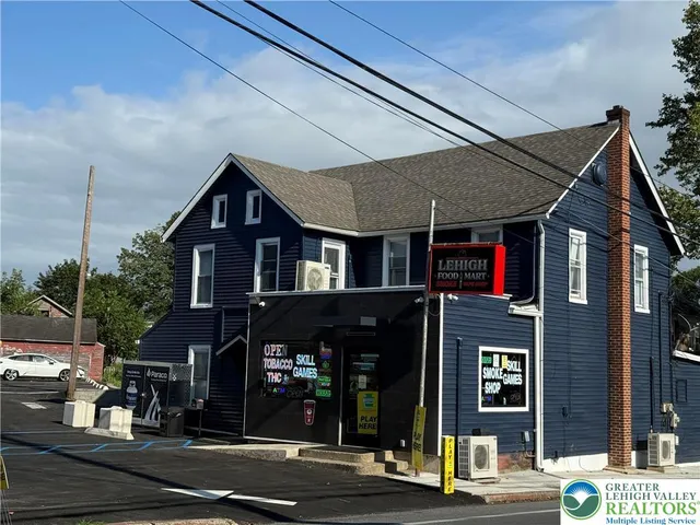 a front view of a building and street