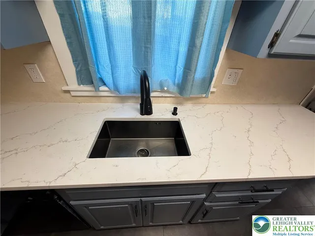 a view of an empty room with stairs