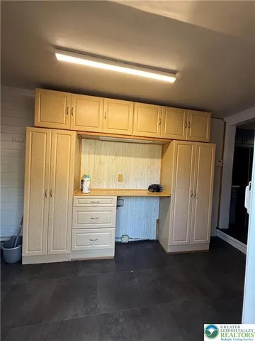 a view of walk in closet with window