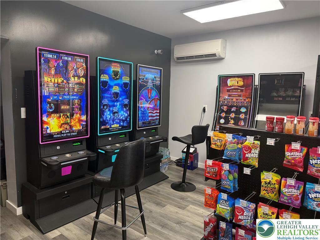 500 Belfast Road Nazareth, PA 18064 - Photo 5 of 34 a living room with furniture and a bookshelf