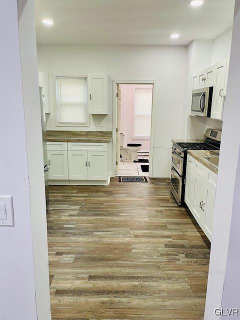 281 5th Street Whitehall, PA 18052 - Photo 12 of 36 a room with kitchen island granite countertop a stove top oven a sink and dishwasher