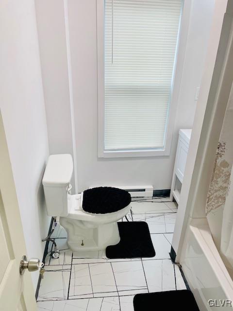281 5th Street Whitehall, PA 18052 - Photo 18 of 36 a bathroom with a sink a toilet and a mirror
